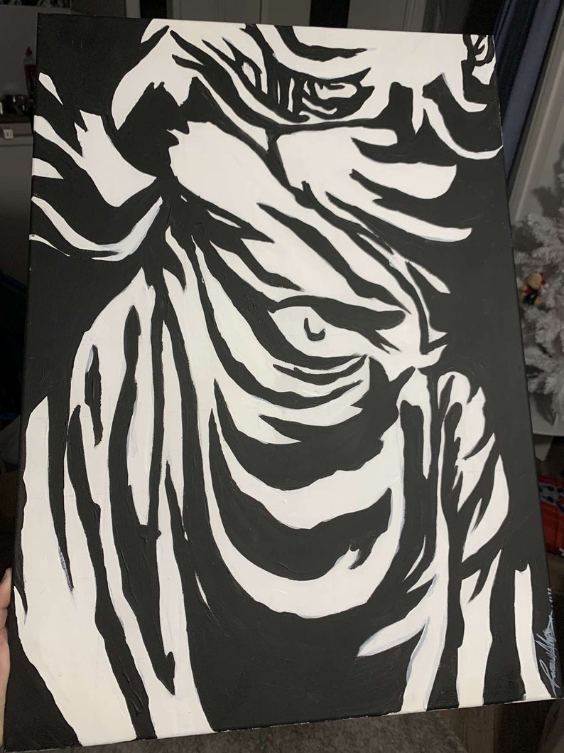 May include: Black and white abstract painting on canvas with bold, swirling lines and shapes.