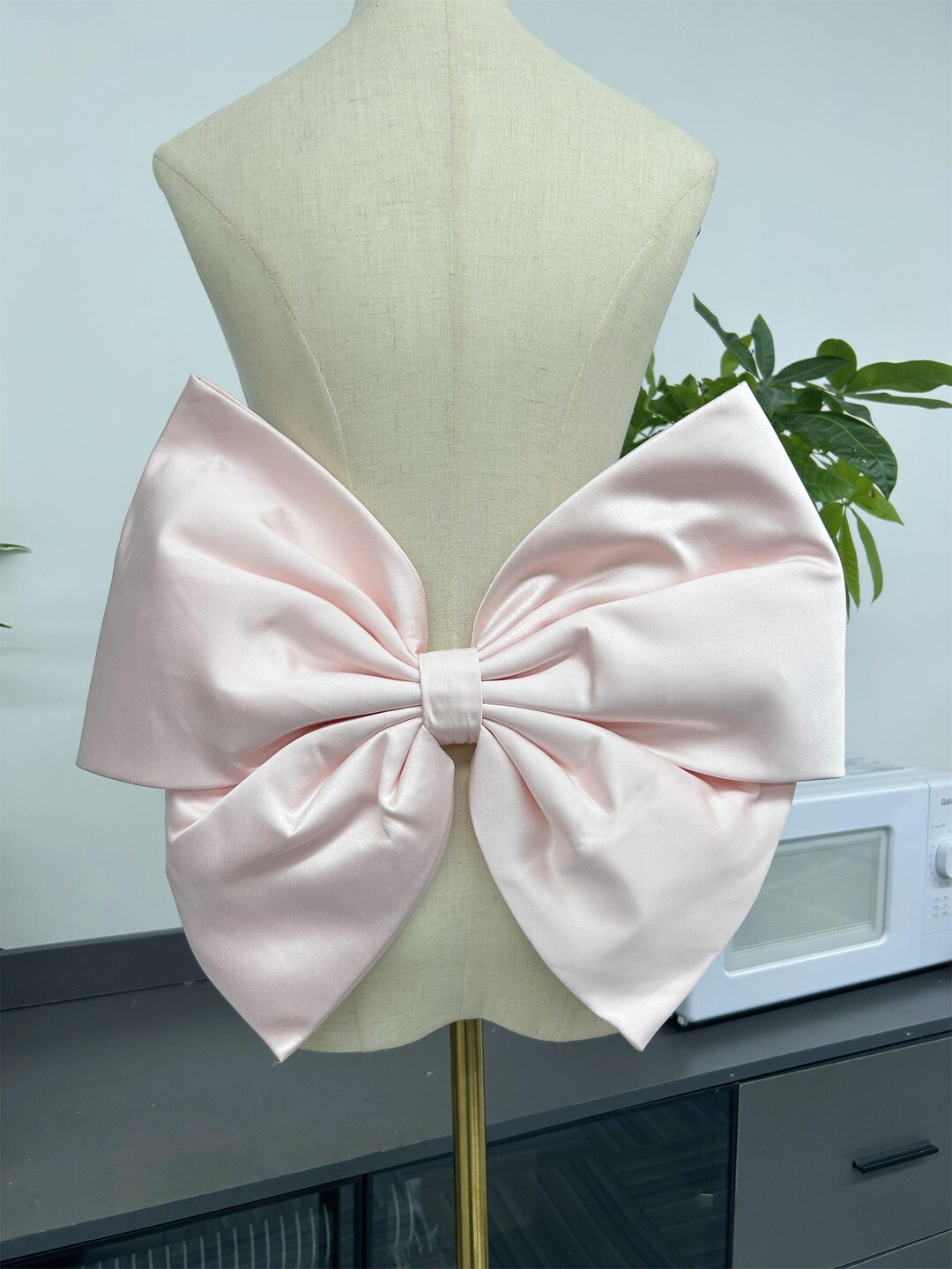 sculptor Bow pink ロンT ピンク