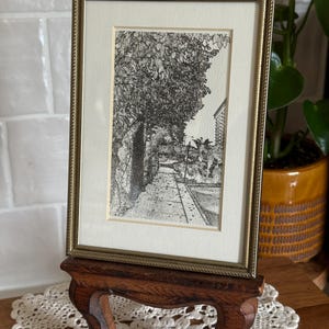May include: A rustic wooden sign with the text "Welcome to our home" in white lettering. The sign features a distressed finish and a simple, inviting design, perfect for entryway decor.
