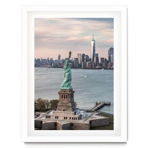 the Statue of Liberty, a famous landmark in New York City, with the city skyline in the background.