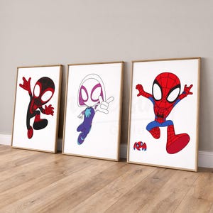 May include: Three framed art prints featuring Spider-Man characters. The prints showcase Miles Morales in black and red, Spider-Gwen in white, purple, and blue, and Spider-Man in red and blue. Each character is depicted in a dynamic pose against a white background.