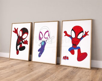 May include: Three framed art prints featuring Spider-Man characters. The prints showcase Miles Morales in black and red, Spider-Gwen in white, purple, and blue, and Spider-Man in red and blue. Each character is depicted in a dynamic pose against a white background.