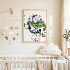 May include: A framed print of Buzz Lightyear from Toy Story, in a nursery setting. The artwork features Buzz in his signature green, white, and purple spacesuit, with a friendly expression. The nursery includes a crib, cloud-shaped pillow, and a mobile.