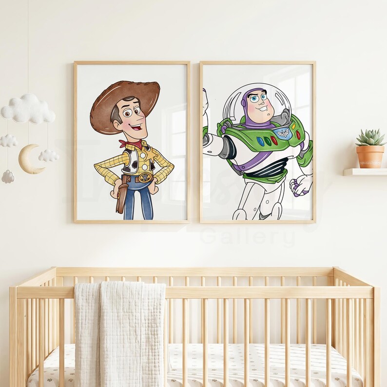 May include: Two framed prints featuring cartoon characters Woody and Buzz Lightyear. Woody is in a cowboy hat and Buzz is in a spacesuit. The prints are in light wood frames, suitable for a nursery or children's room.