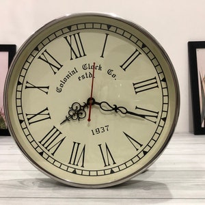 Vintage Colonial Clock Co. Roman Numeral Wall Clock - 11 Inch Chrome Finish