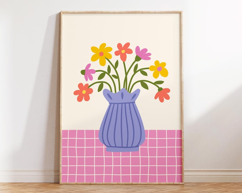 May include: A purple vase with a ruffled top holds a bouquet of colorful flowers. The flowers are yellow, orange, pink, and red. The vase is sitting on a pink and white checkered background.