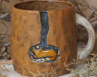 Handmade designer mug with a little fox. Ceramic animal cup. Gift for a fox lover. Cute little fox sleeping in a hole