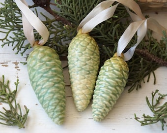 Green ceramic hanging pine cones. A classic pine cone Christmas tree ornament