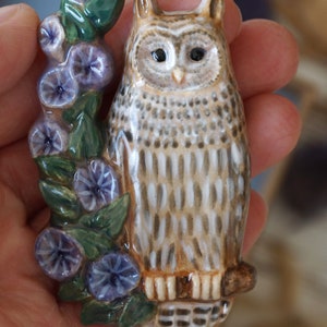 Owl brooch pin. Ceramic eagle owl sits on a branch with blue flowers. Pottery brooch eagle-owl. image 3