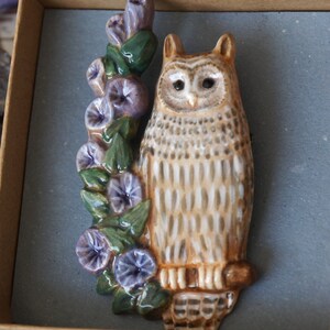 Owl brooch pin. Ceramic eagle owl sits on a branch with blue flowers. Pottery brooch eagle-owl. image 6