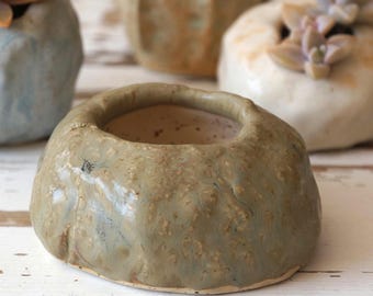 Ceramic stone-shaped planter for succulents and cacti. Green mini handmade planter. Small pot for plants in eco style. Natural flowerpot