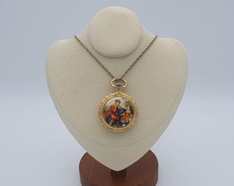 Collar clásico con reloj Dubois de los años 70.