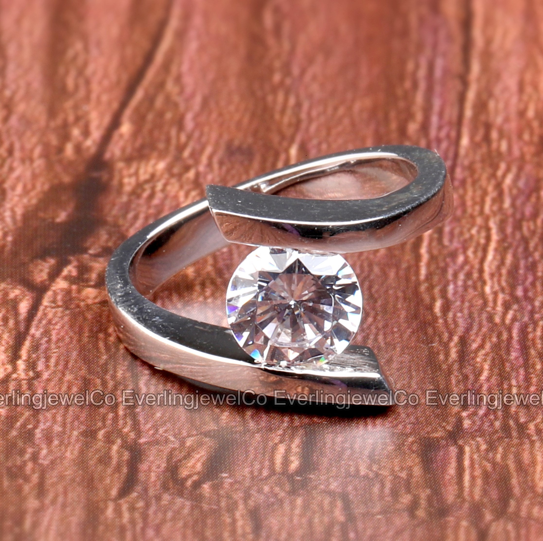 Platinum Spiral Tension Set Engagement Ring
