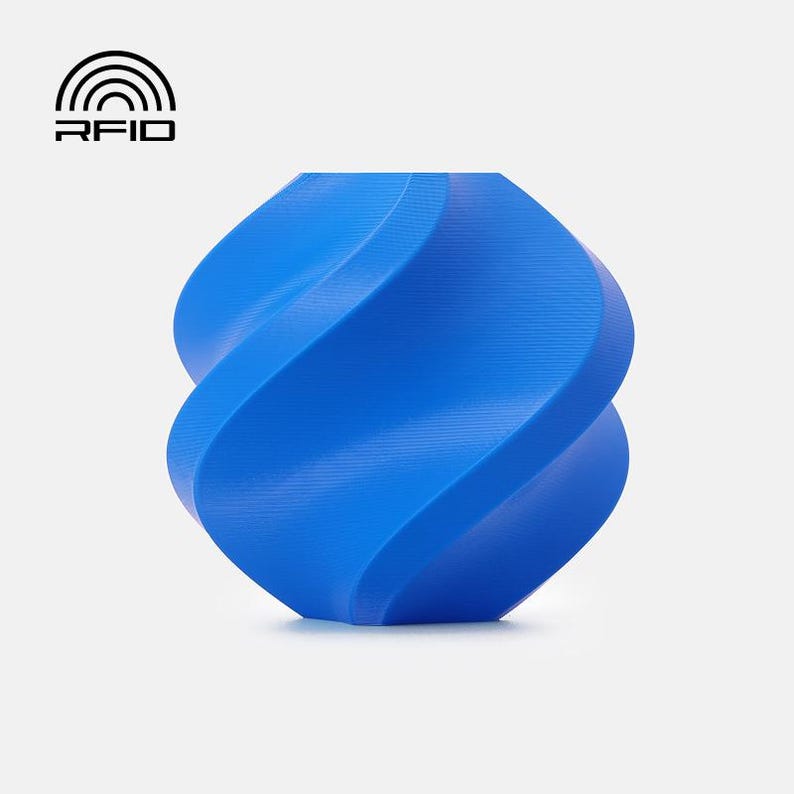 Puede incluir: Un objeto geom&eacute;trico en espiral de color azul brillante con una superficie texturizada. Sobre el objeto, el texto negro RFID se muestra junto a un icono gr&aacute;fico que consiste en cuatro semic&iacute;rculos conc&eacute;ntricos de radiofrecuencia.