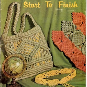 May include: A vintage book cover titled "MACRAME Start To Finish" with a macrame bag, a globe, a macrame belt, and a macrame wall hanging. The bag is beige with a yellow interior. The wall hanging is orange and green.