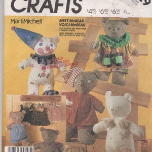 May include: McCall's Crafts 2629 sewing pattern envelope featuring illustrations of various stuffed teddy bears. One bear wears a clown hat and collar, another has binoculars and a green ruff, one wears pajamas, and one is a white bear with handwritten signatures.