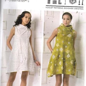 May include: Vogue Patterns designer original sewing pattern. The image shows two sleeveless dresses. One is white with a small pattern, and the other is yellow-green with a diamond pattern. The pattern number is V9112.