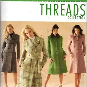 May include: A Simplicity sewing pattern envelope 4403 for the Threads Collection, featuring four coat designs in gray, green, and pink. The text reads Simplicity, 4403, Size K5 8, 10, 12, 14, 16, Step by step to sewing success, and THREADS COLLECTION.