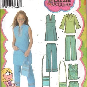 May include: Simplicity sewing pattern featuring Lizzie McGuire. The pattern includes options for a tunic, pants, and shorts. The image shows a girl wearing a blue tunic and pants, with a matching purse. The pattern is size AA 8-16.