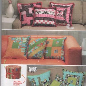 May include: Simplicity pattern 1788 featuring patchwork pillow designs. The image showcases various colorful pillows with geometric patterns, including pink, green, and blue. The pattern also includes a jelly roll of fabric strips for patchwork projects.