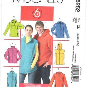 May include: McCall's M5252 sewing pattern envelope for size XN. The front displays illustrations of six jacket and vest variations in lime green, pink, blue, yellow, and orange, alongside a photo of a teal vest and an orange hooded sweatshirt.