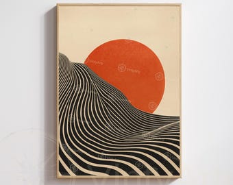 May include: Framed art print featuring an abstract landscape. A large orange sun is set against a cream-colored sky. Below, black and white wavy lines create a stylized mountain range. The artwork is in a wooden frame.