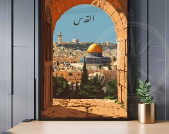 May include: Framed art print showing a view of Jerusalem through an archway. The artwork features a golden-domed building, other structures, and the Arabic text "Al-Quds" against a blue sky. The frame is black, and the archway is in shades of brown and tan.