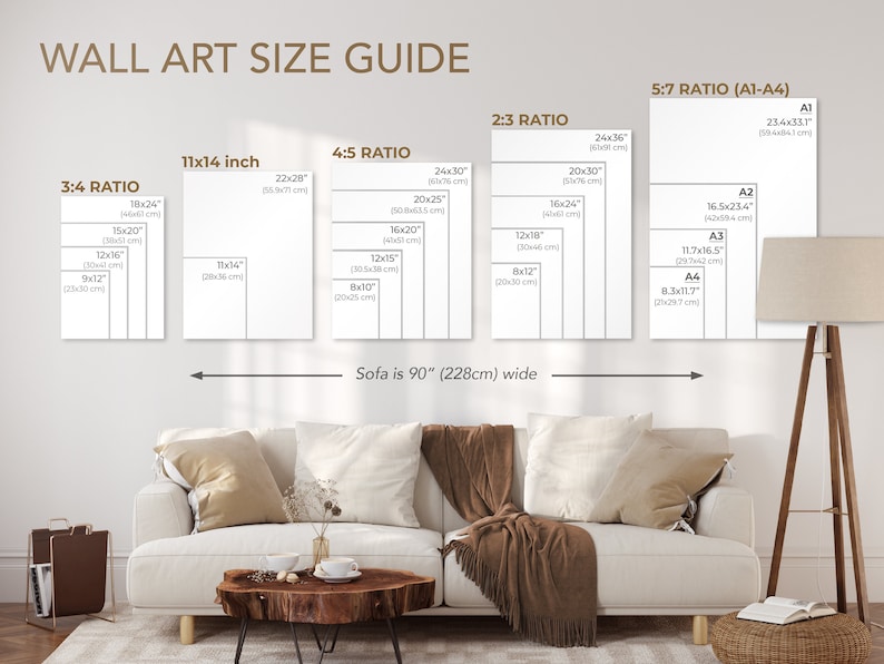 May include: A wall art size guide shows print dimensions, including 28x36 cm, 46x61 cm, and 61x91 cm sizes. The guide is displayed above a sofa that is 228cm wide. The text "WALL ART SIZE GUIDE" is at the top.