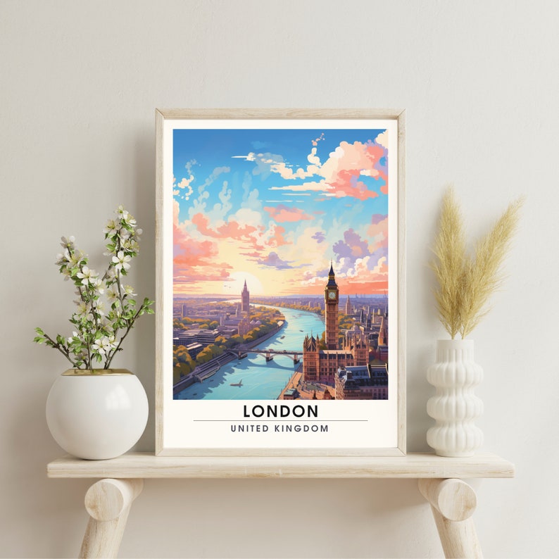 May include: A framed print of a colorful illustration of the London skyline, featuring Big Ben and the River Thames. The print has the text "LONDON" and "UNITED KINGDOM" below the image.