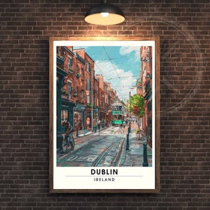 May include: A framed print of a Dublin street scene, showing a green tram, red brick buildings, and people. The artwork is in a wooden frame, mounted on a brick wall. The print includes the text "DUBLIN" and "IRELAND" at the bottom.