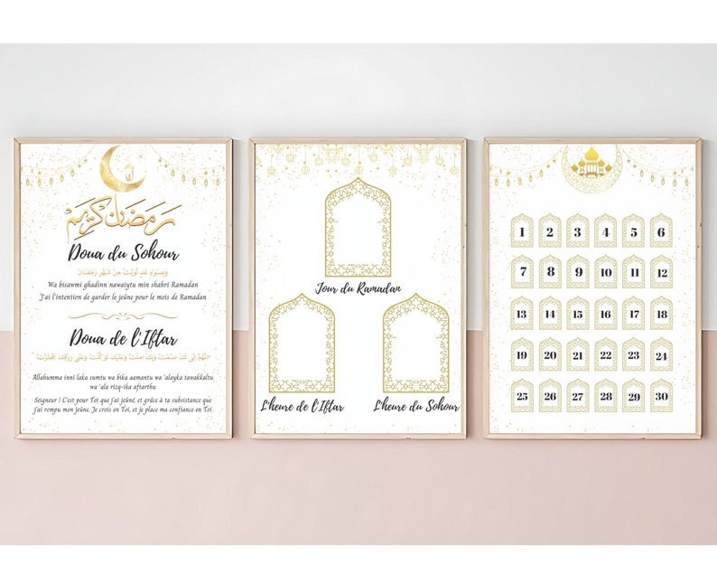 May include: Three framed prints with gold accents and Arabic calligraphy. The left print features text in Arabic and French, the center print has three arched frames, and the right print is a calendar. The theme is related to Ramadan.