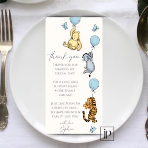 May include: Thank you card with Winnie the Pooh and friends. The card features a blue and white background with illustrations of Winnie the Pooh, Piglet, and Tigger. The text reads "Thank you for sharing my special day! Your love and support mean more than I can say. Just like Pooh, I'm lucky, it's true... to have friends & family like you. With love, Sophia."