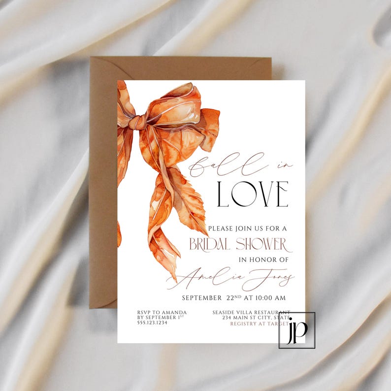 May include: A white bridal shower invitation card featuring a large watercolor orange bow. The text reads: fall in LOVE, PLEASE JOIN US FOR A BRIDAL SHOWER IN HONOR OF Amelia Jones, SEPTEMBER 22ND AT 10:00 AM, RSVP TO AMANDA BY SEPTEMBER 1ST 555.123.1234, SEASIDE VILLA RESTAURANT 234 MAIN ST CITY, STATE, REGISTRY AT TARGET.