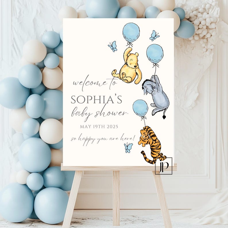 May include: A Winnie the Pooh themed baby shower welcome sign with blue and yellow balloons, butterflies, and the text "Welcome to Sophia's Baby Shower May 19th 2025 So happy you are here!"
