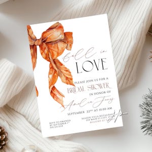 Rust orange watercolor bow Fall in Love bridal shower invitation template for Canva. Digital download