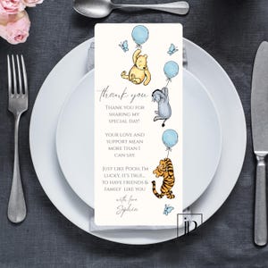 May include: A Winnie the Pooh themed thank you card with blue balloons and butterflies. The card says "Thank you for sharing my special day! Your love and support mean more than I can say. Just like Pooh, I'm lucky, it's true... to have friends & family like you. With love, Sophia."
