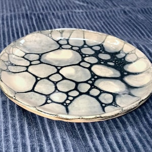 Small plate with soap bubbles
