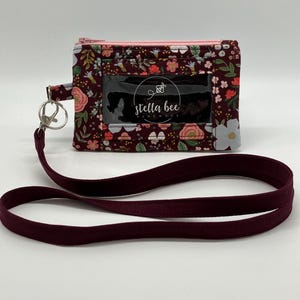 Porta credencial con cordón, monedero con bolsillo para identificación y llavero de Rifle Paper Co.