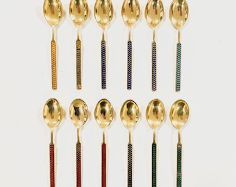 Set of 12 MEKA coffee spoons with beautiful enamel handle decoration in great Danish mid century moden design