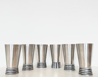 Set of six vintage mid century modern steel tumblers - wine cups or table vases - with artistic brutalist bases