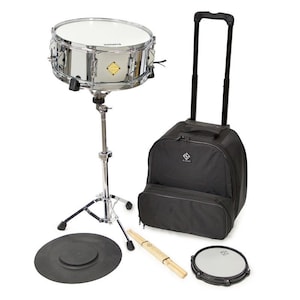 May include: A complete drum set with a snare drum on a stand, a black carrying case with a handle, a cymbal, a drum practice pad, a drum stick, and a small drum. The snare drum is silver with a white drum head.