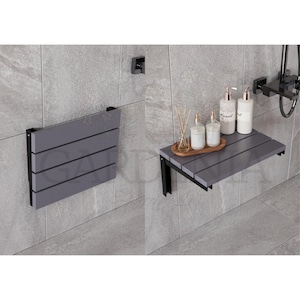 May include: A gray folding wall-mounted shelf with black metal brackets. The shelf is made of wood and has a slatted design. The shelf is shown in a bathroom setting with bottles of soap and other bathroom accessories on top.