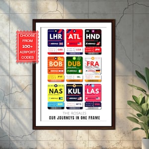 May include: A framed print featuring colorful travel-themed tags with airport codes like LHR, ATL, and HND. The tags display country flags and the text "ARRIVALS." The print includes the text "CHOOSE FROM 100+ AIRPORT CODES" and "OUR JOURNEYS IN ONE FRAME."
