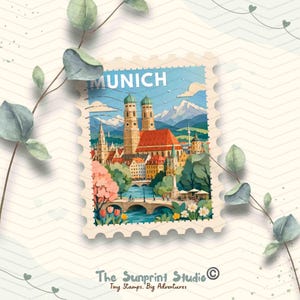 May include: A rectangular postage stamp illustration featuring the Munich skyline with the Frauenkirche cathedral, red-roofed buildings, a stone bridge, and distant mountains. The text MUNICH is at the top, and The Sunprint Studio is at the bottom.