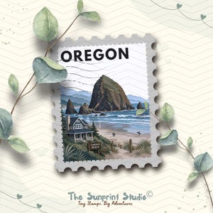 May include: A postage stamp illustration featuring the text OREGON at the top and CANNON BEACH on a sign. The image depicts a large coastal rock formation, a house with a porch, sandy beach, and ocean waves. The stamp has a scalloped edge border.