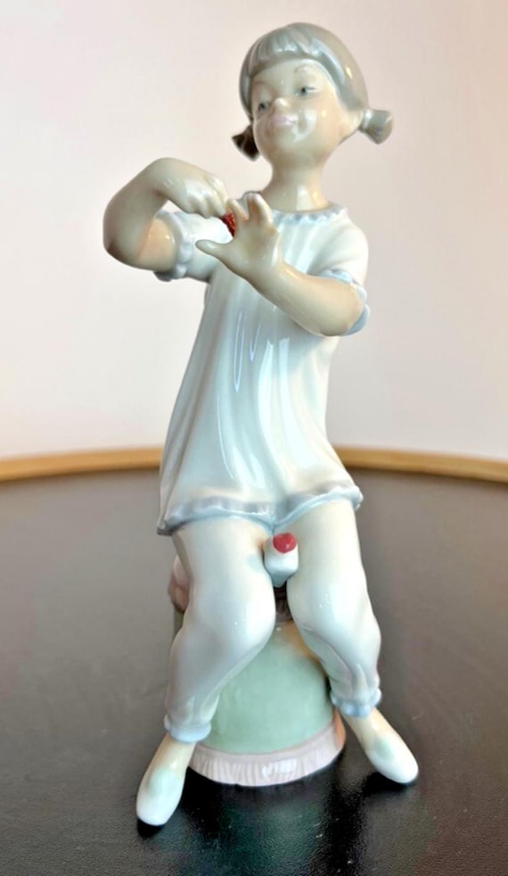 Lladro Girl Manicuring in Pyjamas, Number 1082 Nail Polish Porcelain Figurine