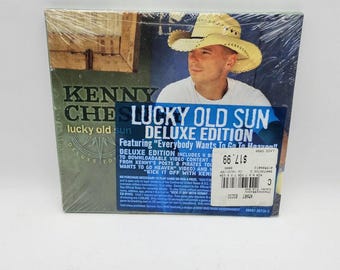 CD musicale di Kenny Chesney - Lucky Old Sun (Edizione Deluxe). CD NUOVO!
