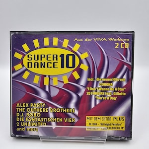 May include: A purple CD case with a yellow sun graphic and the text "Super Dance 10" on the front. The case includes a list of artists and songs, including Corona, 20 Fingers, Alex Party, The Outthere Brothers, D.J. Bobo, Die Fantastischen Vier, 2 Unlimited, and more. The case also includes the text "Aus der VIVA-Werbung 2 CD" and "Mit dem Extra Plus".