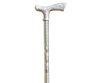 Elegante bastón de aluminio: mango con detalles florales ornamentados y soporte ligero.