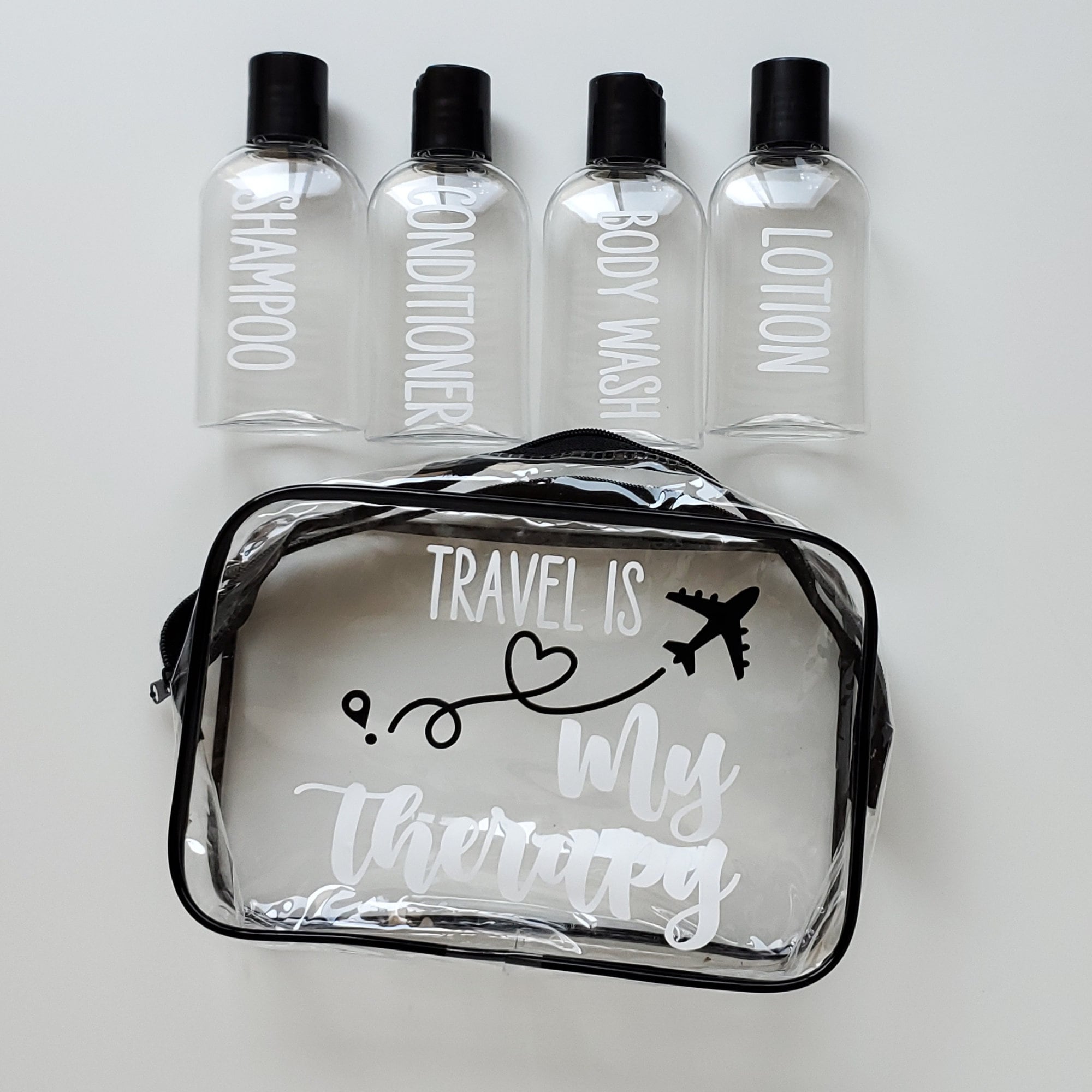 TSA-Compliant Durable Plastic Travel Bottles Set – 4 Squeezable Portable  Bottles in Clear Zippered Pouch for Shampoo, Lotion, Conditioner & More 